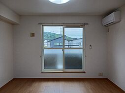 ドゥ・ドミール　Ｃ 205 2階1LDKのリビング/ダイニング