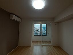 コンフォール・アイリス 204 2階1LDKのリビング/ダイニング