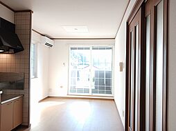 ムーラン・ルージュI 201 2階2DKのリビング/ダイニング