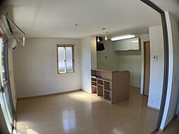 フレンドリースクエア桜　A棟 105 1階2LDKのリビング/ダイニング