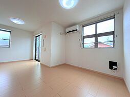 ジュネス原1番館 204 2階1LDKのリビング/ダイニング