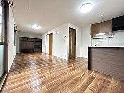 プラシード　A棟 A101 1階1LDKのリビング/ダイニング