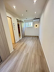 ＥｄｇｅＭｏｍｅｎｔ長江 105 1階ワンルームのリビング/ダイニング