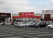 【ドラッグストア】サンドラッグ　行橋店まで1930ｍ