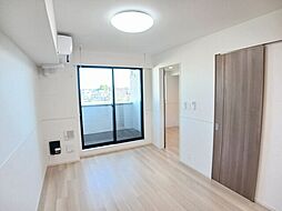 ヒカルサ土浦神立イーストI 302 3階2LDKのリビング/ダイニング