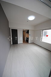 エグゼ大阪ドームII 8階ワンルームのリビング/ダイニング