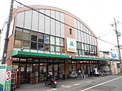 【スーパー】FOOD　SHOPエムジー嵯峨車折店まで421ｍ