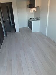 ジーメゾン豊春 1階1LDKのリビング/ダイニング