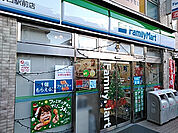 【コンビニエンスストア】ファミリーマート 矢野口駅前店まで891ｍ